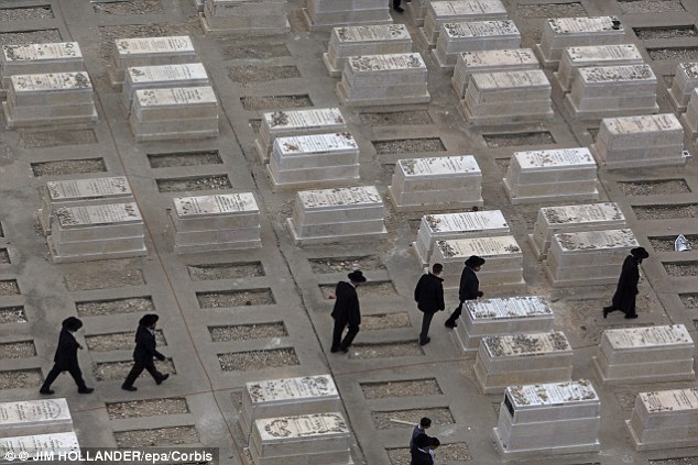 Drilling and boring beneath the mountain is already underway, while space on the mountaintop's existing above ground cemetery (pictured) is scare